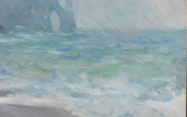 Etretat in the Rain by Claude Monet: The sea shifts between green and blue