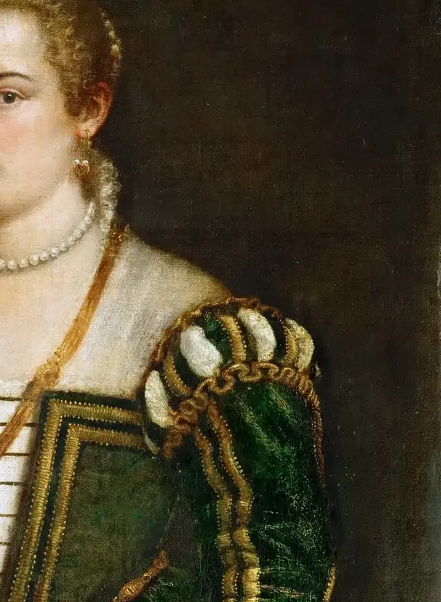 Lavinia (?) by Titian: The raised dish creates the painting's action